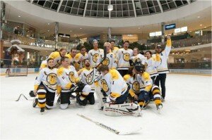 Men's hockey team celebrating